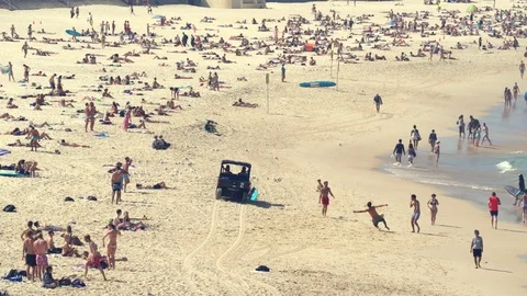 Crowded beach with a buggy - Bondi beach, Sydney, Australia Stock Footage 76547624