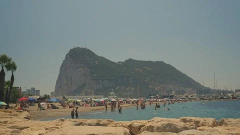 Crowded Beach with Gibraltar Rock in Background Stock Footage 341958428