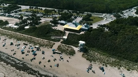 Crowded  beach with  lifeguard Stock Footage 103283288