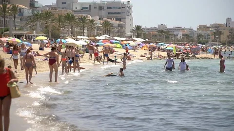 Crowded beach in Mallorca Stock Footage 128349090