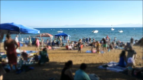 Crowded beach with sand and blurred people Stock Footage 93035399