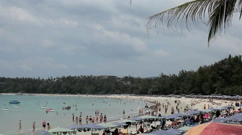 Crowded beach in summer, boat, ship, sunbathers, swim suit, swimming Stock Footage 4089117