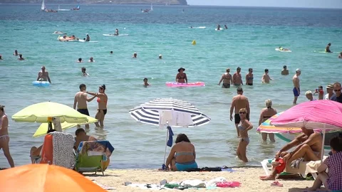 Crowded beach in the summer Stock Footage 128349215