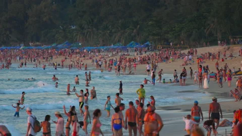 Crowded beach, sunset Stock Footage 171633797