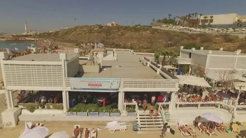 Crowded beach in Tel Aviv, drone footage 1080p 50p Video stock 77876719