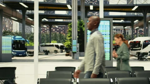 Crowded bus terminal with diverse passengers prepare for interstate travel Stock Footage 334722624