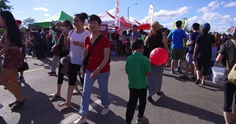 Crowded Chinatown Chinese and Asian food festival market Stock Footage