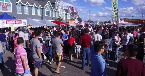 Crowded Chinatown Chinese and Asian food festival market Stock Footage