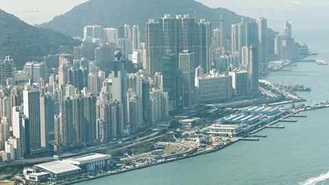 Crowded Coastal Cityscape with Complex Highway Traffic 库存影片 74989271