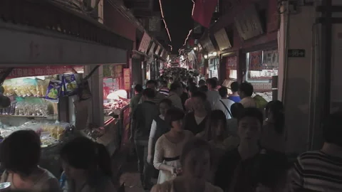 Crowded crowds at Shanghai Qibao Old Street during the festival Stock Footage 160080053