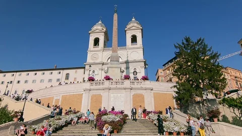 Crowded decorated Spanish steps and Trinita dei Monti church in Rome, Italy Stock Footage 95198937