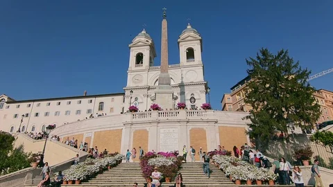 Crowded decorated Spanish steps and Trinita dei Monti church in Rome, Italy Stock Footage 95209349