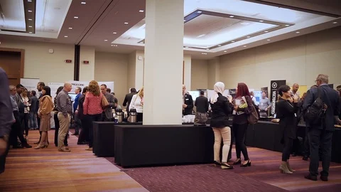Crowded exhibit hall in a convention centre at a corporate conference. Stock Footage 102352285