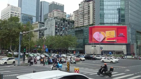 Crowded Intersections and Billboards in Downtown Chengdu Stock Footage 339649747
