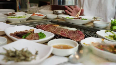 A Crowded Korean Barbecue Table At A Restaurant 스톡 동영상 248997853