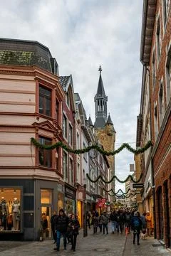 Crowded Kramerstrasse leading to Granus Tower during Christmas season in Aach Stock Photos