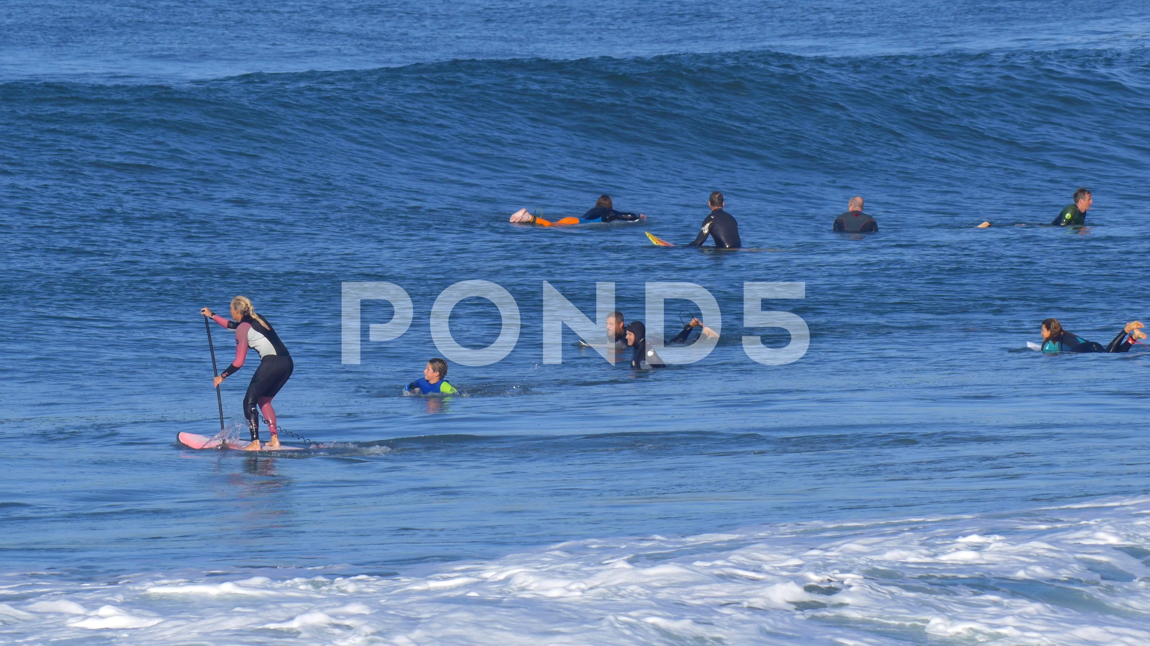 A Crowded Lineup Of Surfers Surfing Stock Video Pond5
