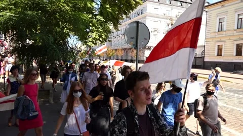 Crowded, massive, parade, march, marching, walk, procession down the street. Stock Footage 137455584