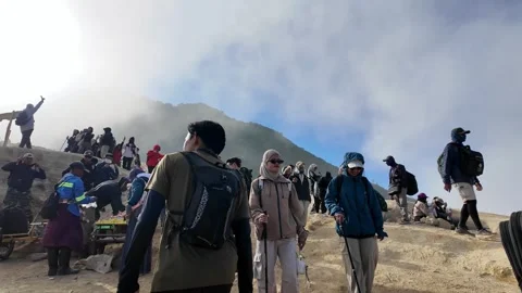 Crowded Mountain Summit Tourists Enjoy Misty Mount Ijen View Stock Footage 345144789