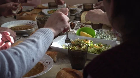 Crowded muslim family eating vegan food and having iftar in a ramadan day Stock Footage