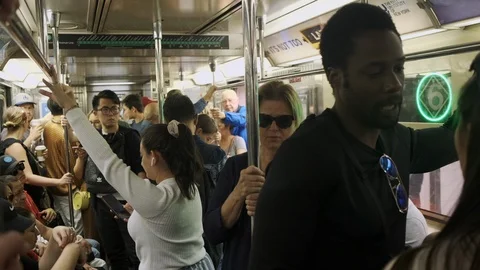 Crowded New York City Subway Train. Traveling in a busy subway car in nyc. Stock Footage