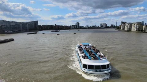 Crowded passenger ship on regular cruise through town Stock-Footage 160237294