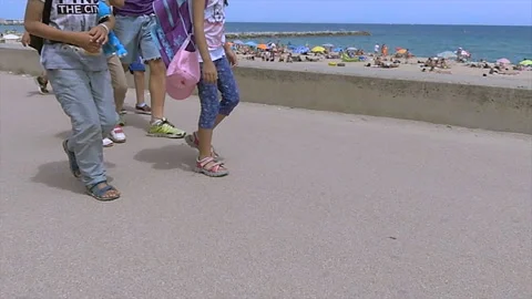 Crowded Pathway Legs Next To The Beach Stock Footage 94666639