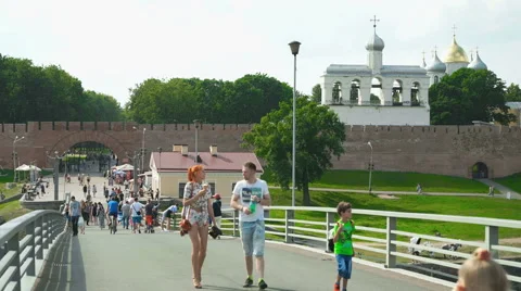 The crowded pedestrian bridge over the river Stock Footage 66453751