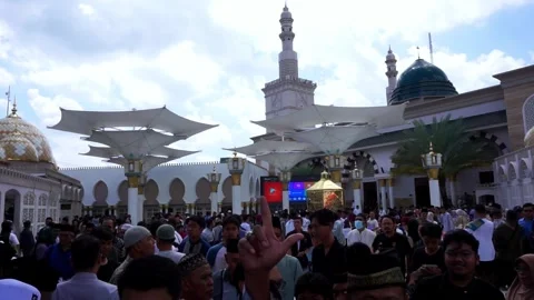 Crowded people at the beautiful Ar-Rahman mosque Stock Footage 274740870