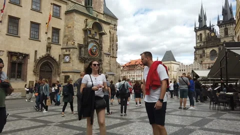 Crowded people walking on old prague city in covid19 pandemic,european landmarks Video stock 138486802