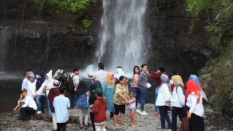Crowded People in Waterfall Stock Footage 111854308