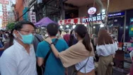 Crowded Of People At Yaowarat Road After Covid-19 Virus Pandemic Stock Footage