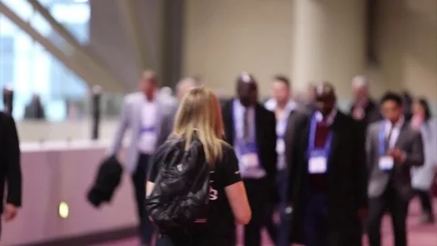 Crowded population and bustling crowd of people walking in slow motion Stock Footage 73754139