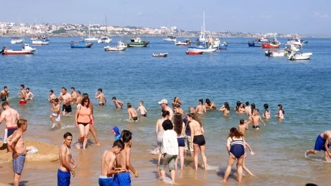 Crowded sandy beach in Cascais near Lisbon, Portugal during the summer. This Stock Footage 111910862