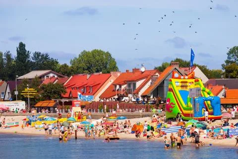 Crowded sandy beach Stock Photos