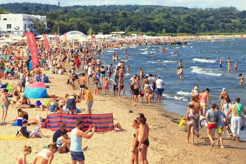 Crowded sandy beach Stock Photos