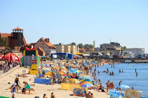 Crowded sandy beach Stock Photos