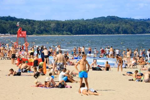 Crowded sandy beach in Sopot Stock Photos