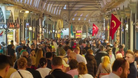 Crowded Spice Bazaar in Istanbul with people and colorful stalls Stock Footage 336677785
