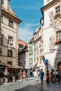 Crowded street in historic centre of Prague with picturesque old Stock Photos