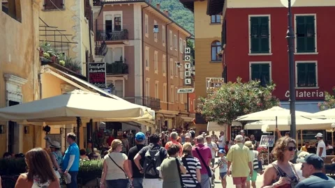A Crowded Street In A Small Tourist Town On A Sunny Day Stock Footage 167478109