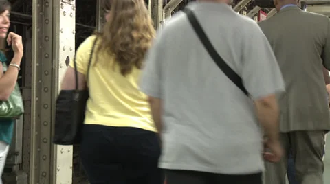 Crowded subway platform, passengers on and off train Stock Footage 39614736