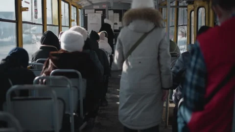 Crowded Train Interior with Commuters as Carriage Slows Toward Stop Stock Footage 318630781