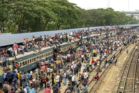 Crowded Train Station With Packed Platform And Long Trains Stock Photos