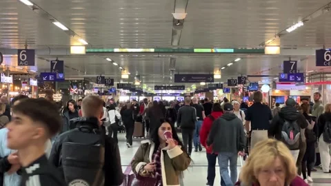 Crowded Transportation Terminal translation Interior With Commuters Walking - Stock Footage 328386844