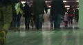Crowded underground passage, people walking at subway station, slow-motion HD Footage