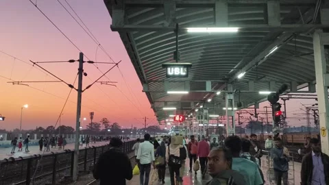 Crowded walking Indian Railway Platform During Sunset Rush Hour Stock Footage 323868161
