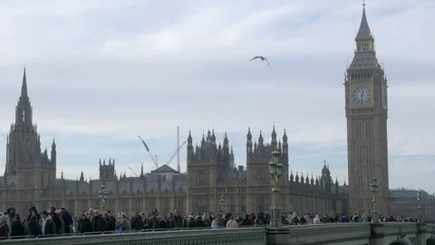 Crowded Westminster Bridge Over Big Ben Houses of Parliament in London Stock-Footage 326004171