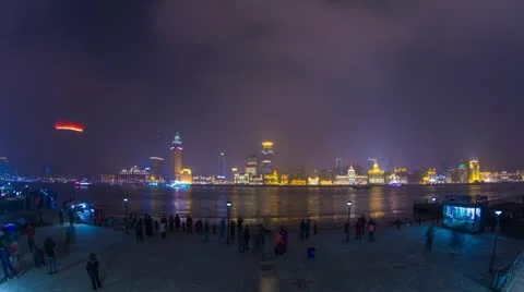 Crowds and Boats Traffic across from The Bund with Flying Lantern Stock Footage