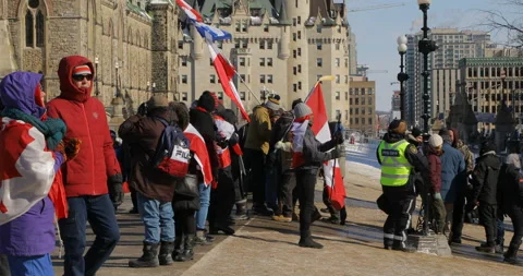 Crowds and protesters with Quebec and Canada flags in Ottawa Stock-Footage 170315771